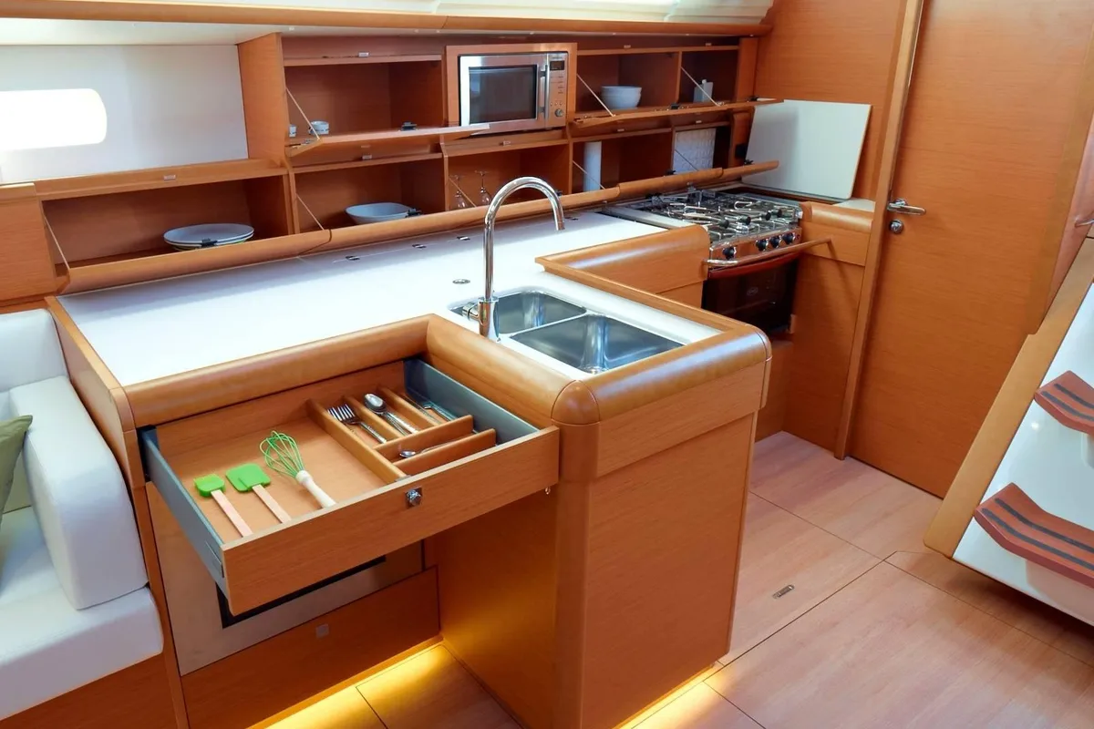 Galley of Montecarlo, a Jeanneau Sun Odyssey 519 sailboat at Capo d'Orlando, Italy