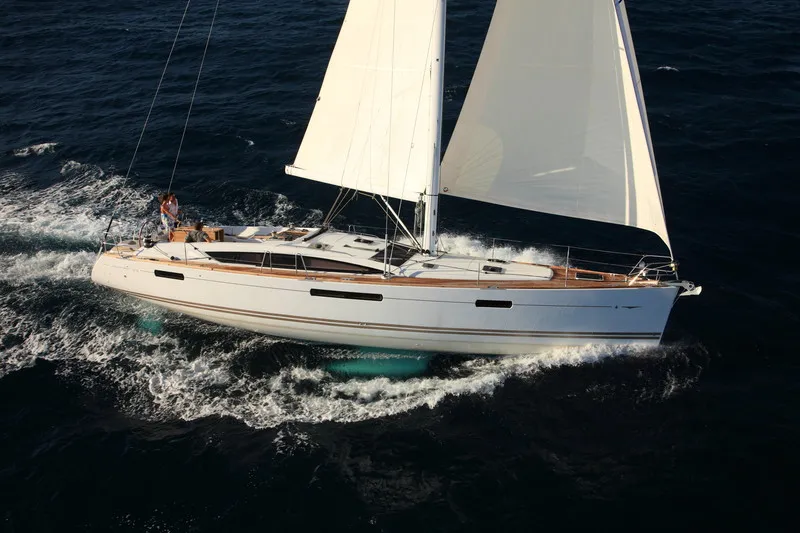 Exterior view of Anita, a Jeanneau 53 sailboat at Olbia, Italy