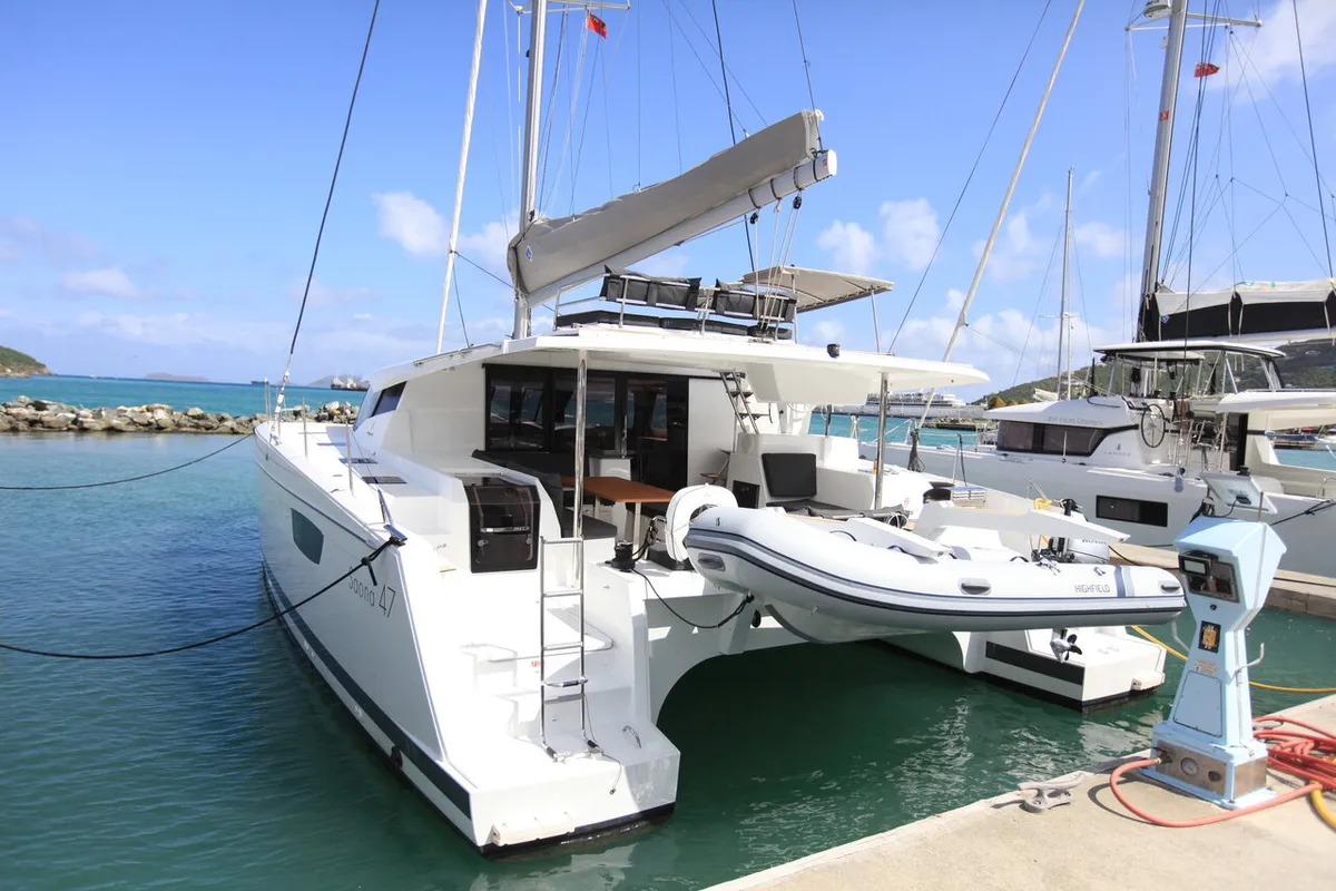 Exterior view of Three Sheets, a Fountaine Pajot Saona 47 Quintet catamaran at Road Town, British Virgin Islands