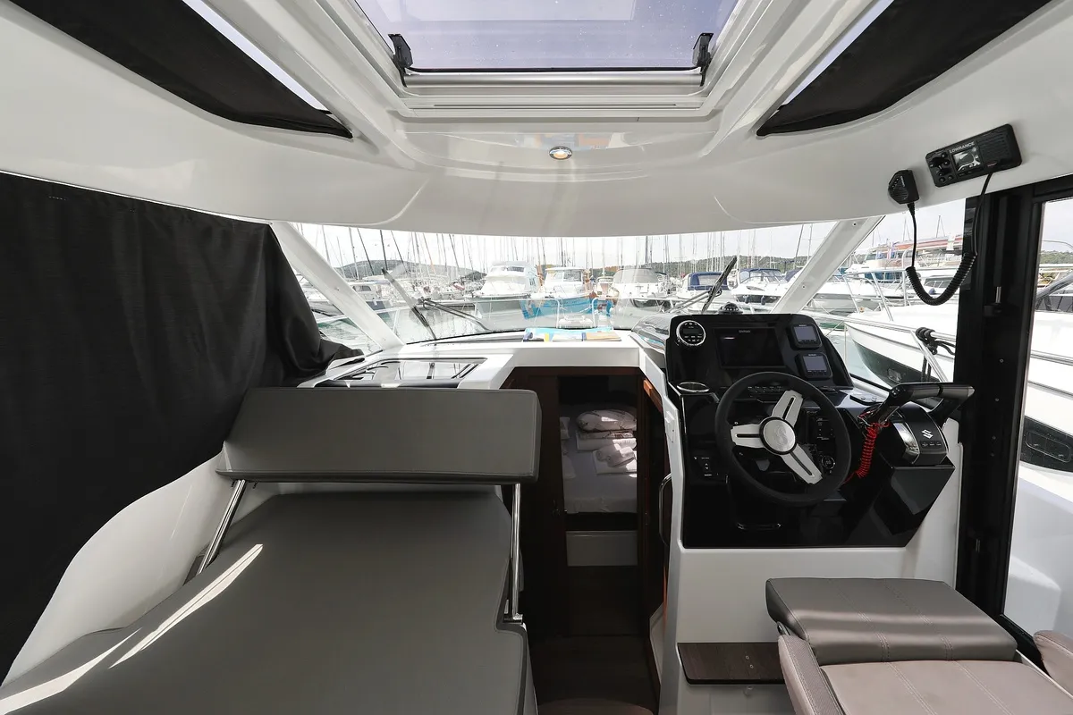 Cockpit of Aurora, a Beneteau Antares 9 OB motorboat at Pirovac, Croatia