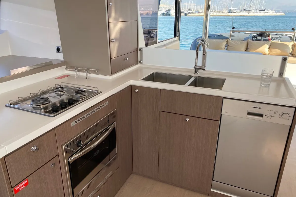 Galley of Baša, a Bali 4.8 catamaran at Grad Kaštela, Croatia