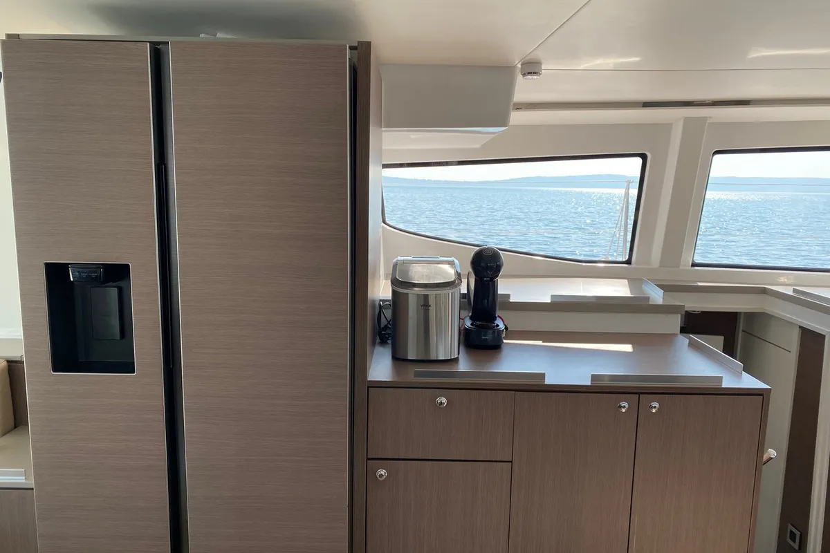 Galley of Baša, a Bali 4.8 catamaran at Grad Kaštela, Croatia