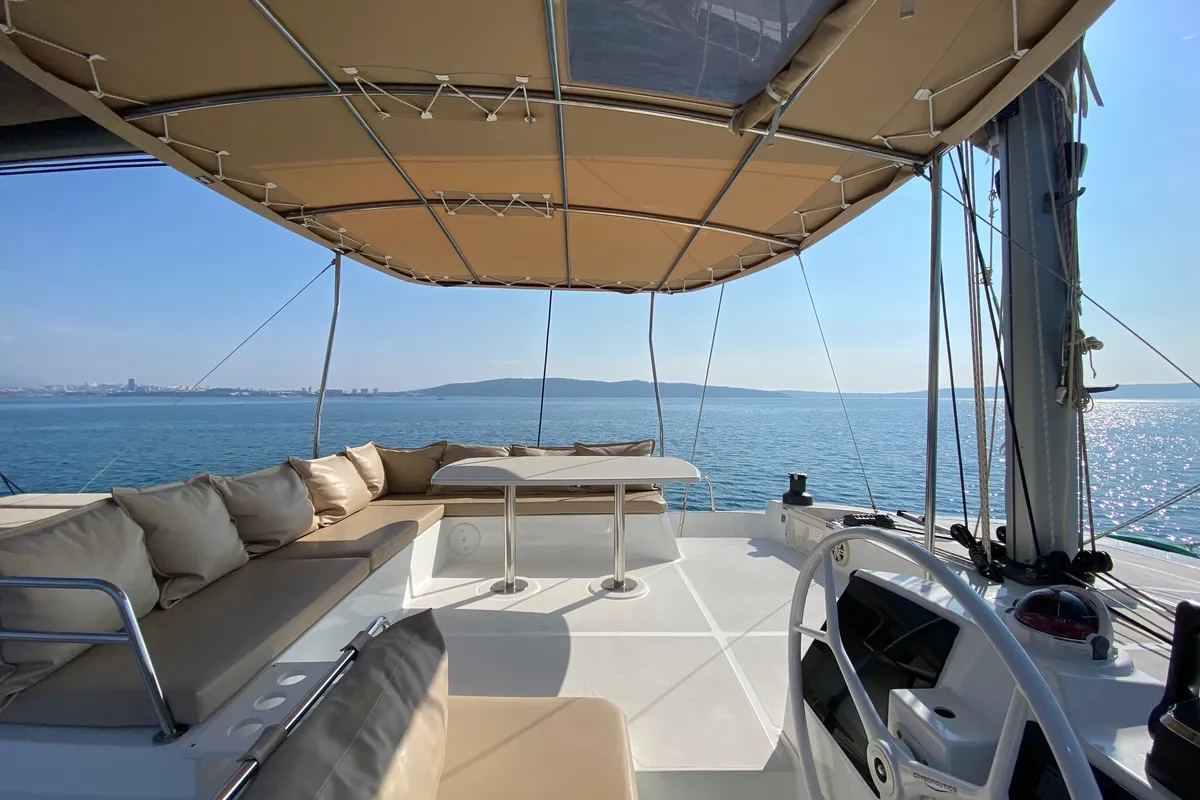 Cockpit of Baša, a Bali 4.8 catamaran at Grad Kaštela, Croatia