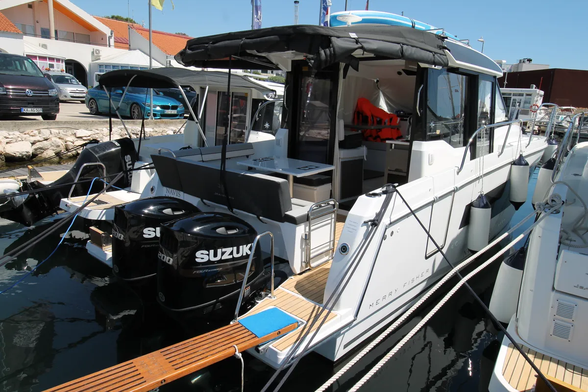 Exterior view of Navis Amoris, a Jeanneau Merry Fisher 895 Serie2 motorboat at Grad Biograd na Moru, Croatia