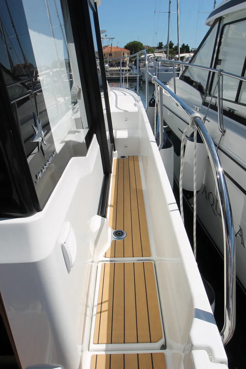 Exterior view of Navis Amoris, a Jeanneau Merry Fisher 895 Serie2 motorboat at Grad Biograd na Moru, Croatia