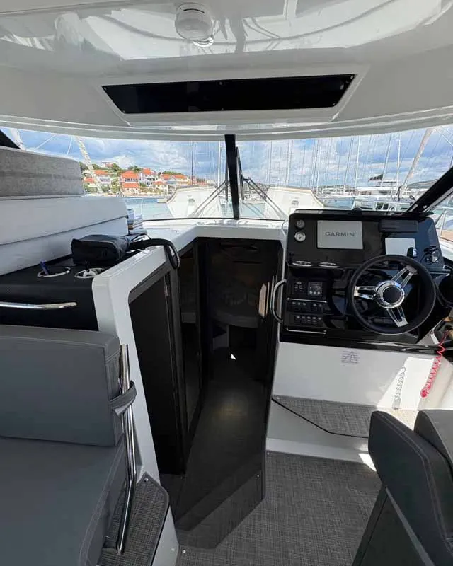 Cockpit of Solea, a Jeanneau Merry Fisher 1095 Fly motorboat at Jezera, Croatia