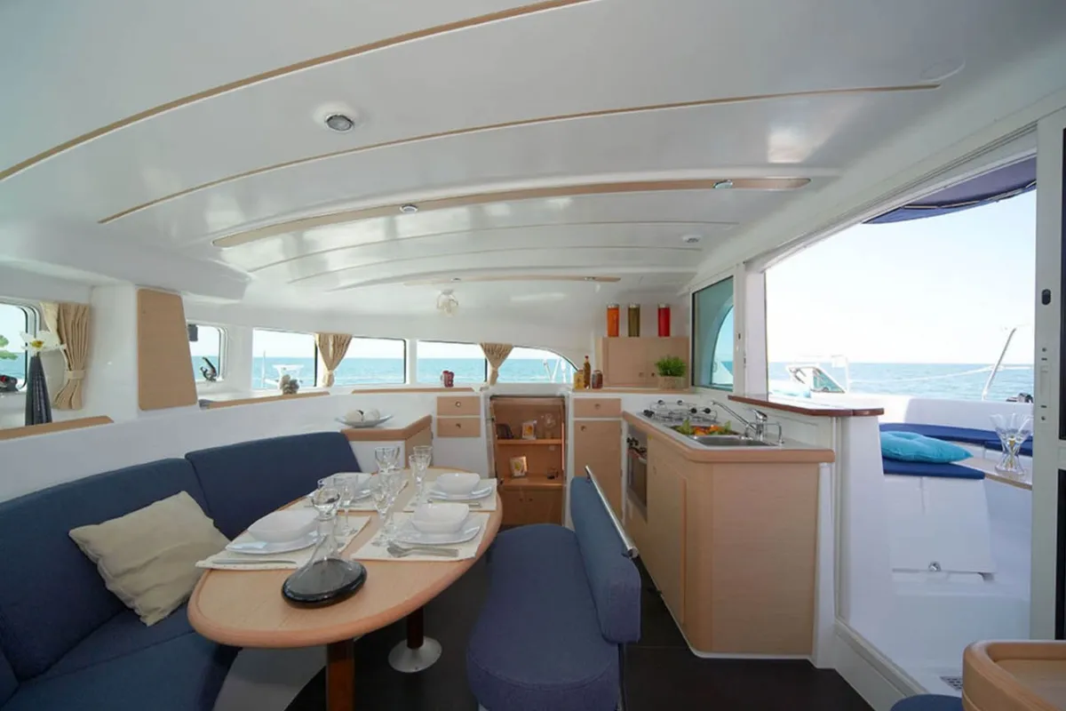 Salon of Kiss, a Lagoon 380 S2 catamaran at Nettuno, Italy