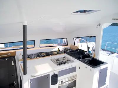 Galley of Manta Va'a, a Marsaudon Composites TS 42 catamaran at La Trinité-sur-Mer, France