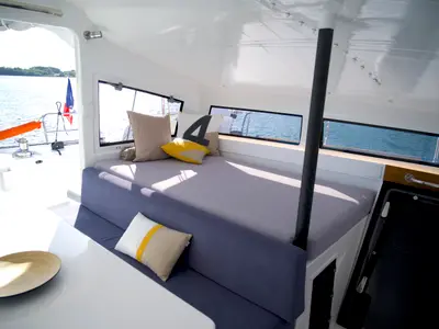 Salon of Manta Va'a, a Marsaudon Composites TS 42 catamaran at La Trinité-sur-Mer, France