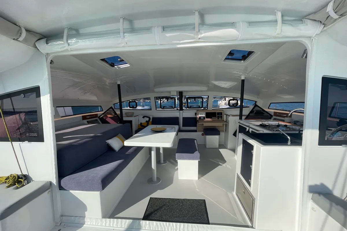Salon of Manta Va'a, a Marsaudon Composites TS 42 catamaran at La Trinité-sur-Mer, France