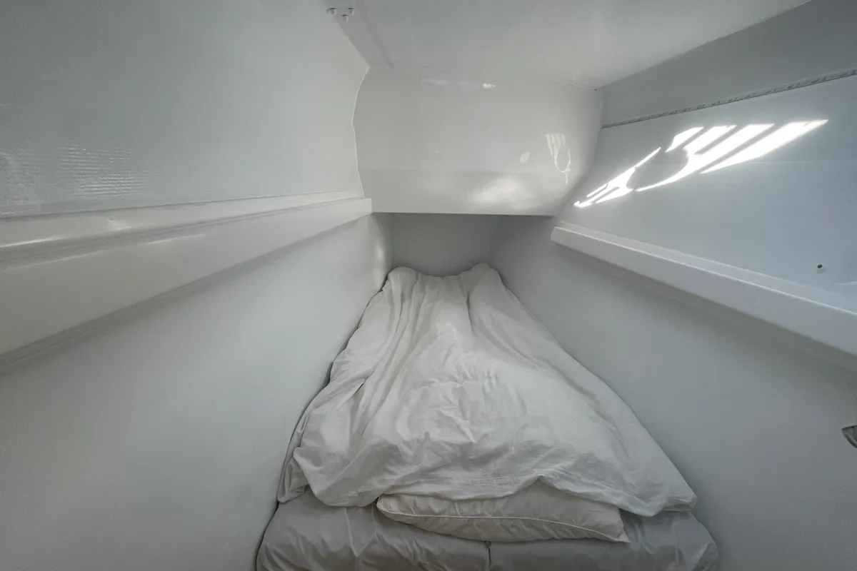 Cabin on Manta Va'a, a Marsaudon Composites TS 42 catamaran at La Trinité-sur-Mer, France