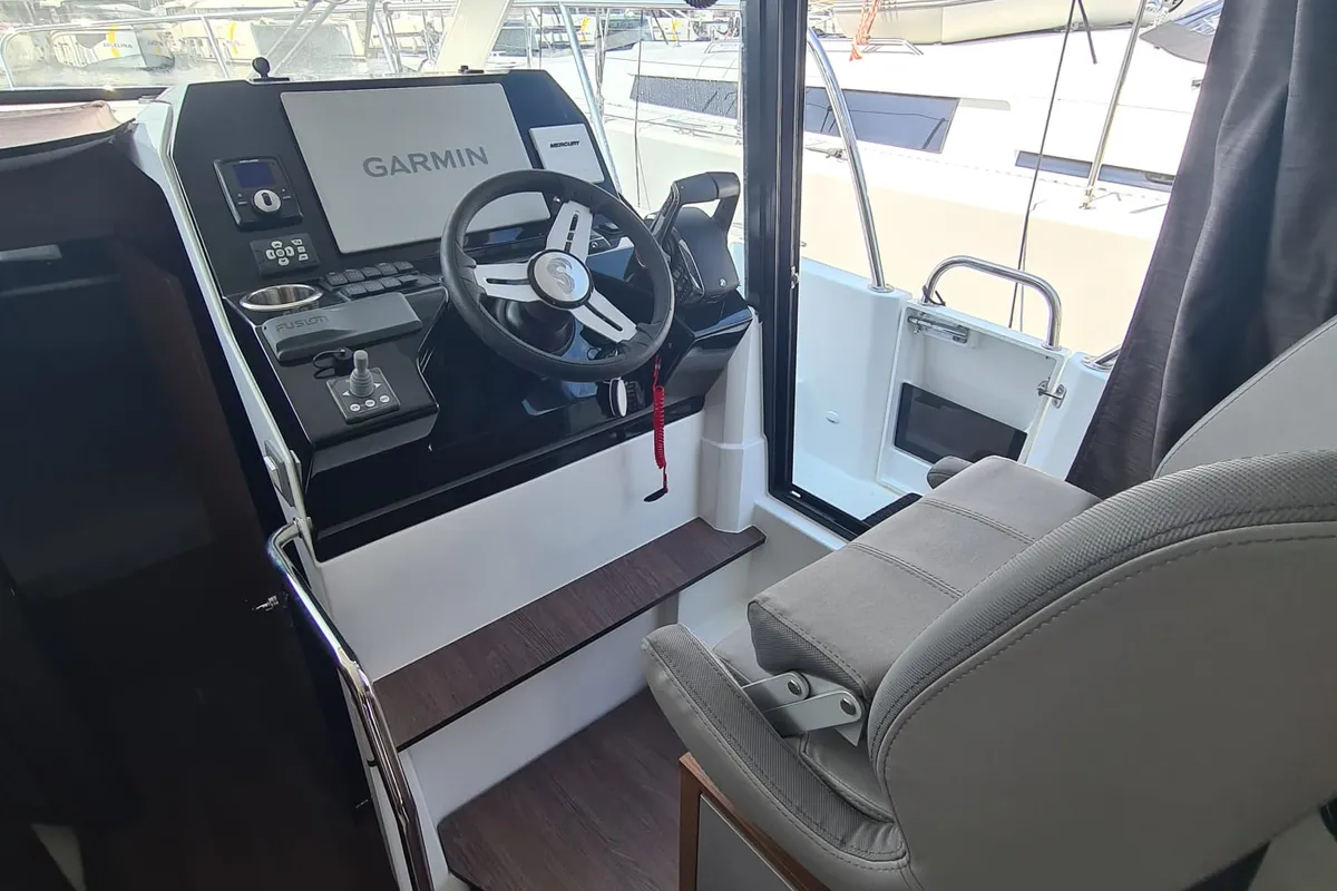 Cockpit of Furiosa, a Beneteau Antares 11 Fly OB motorboat at Grad Šibenik, Croatia