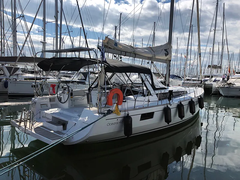 Exterior view of Butterfly, a Beneteau Oceanis 48 sailboat at Kontokali, Greece