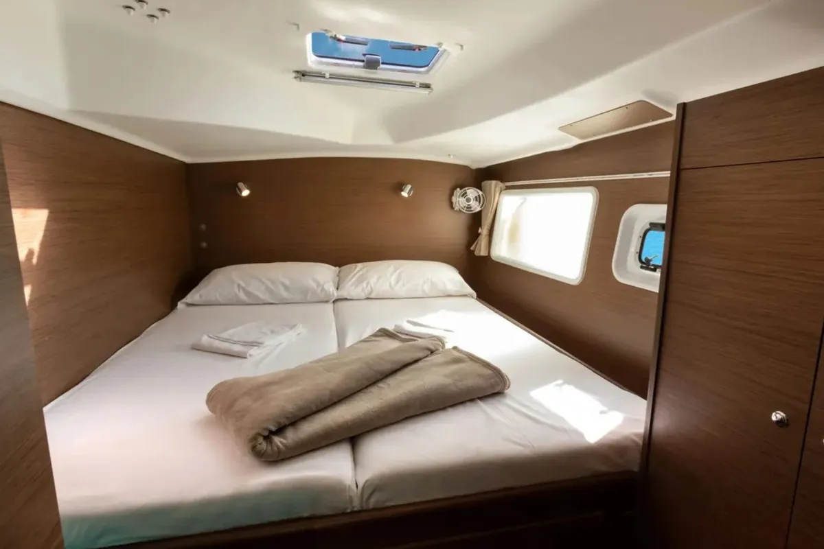 Cabin on Ploto, a Lagoon 380 catamaran at Tropea, Italy