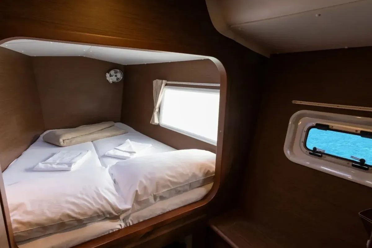 Cabin on Ploto, a Lagoon 380 catamaran at Tropea, Italy