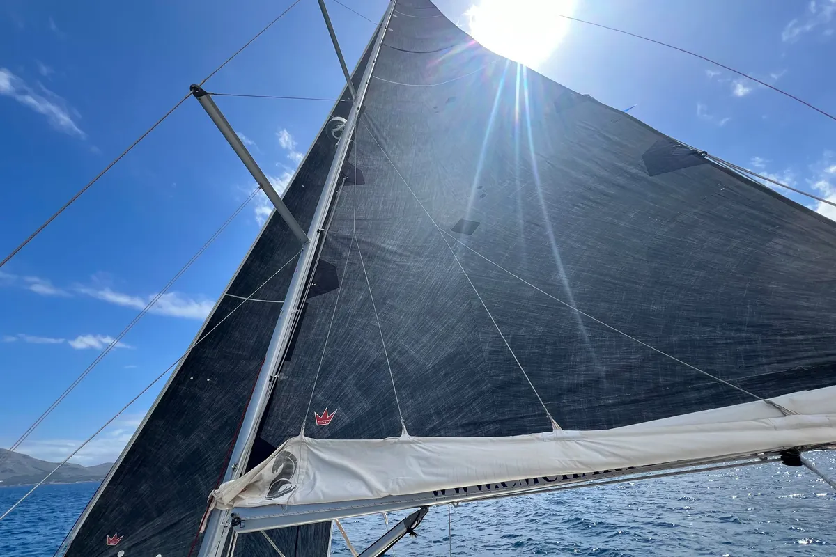 Exterior view of Passepartout, a Beneteau Oceanis 41.1 sailboat at Port de Pollença, Spain