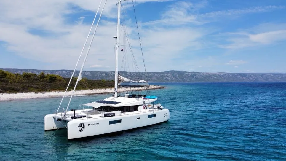 Exterior view of Discovery I, a Lagoon 52F catamaran at Općina Marina, Croatia