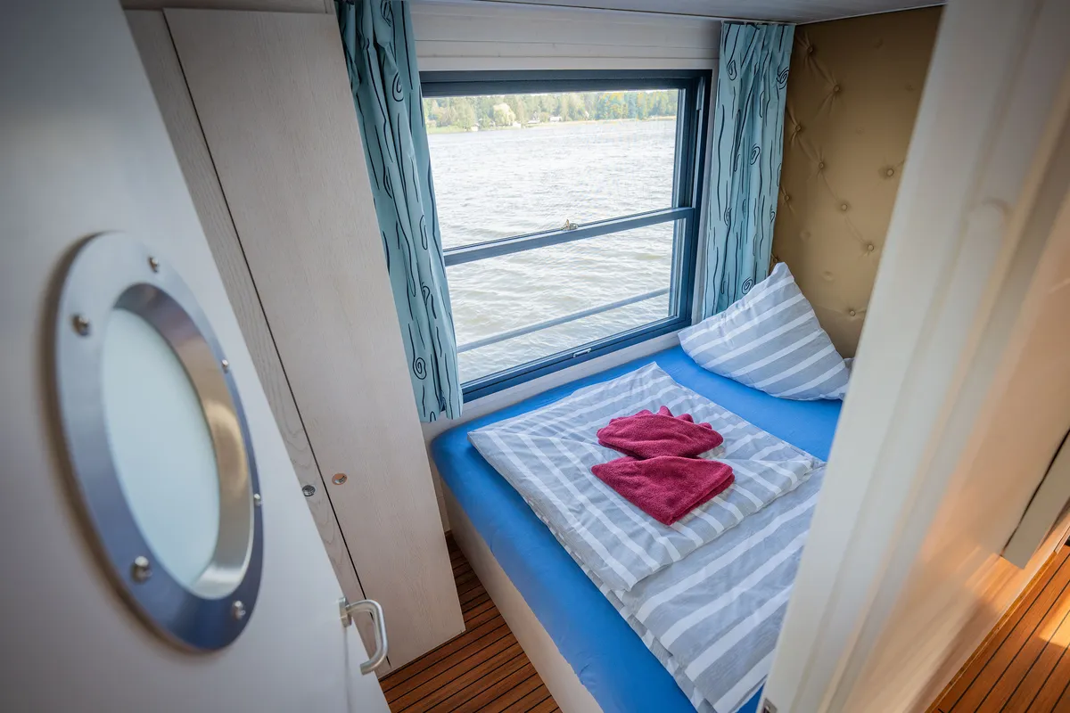 Cabin on Aquila, a Woma D13 motorboat at Fürstenberg/Havel, Germany