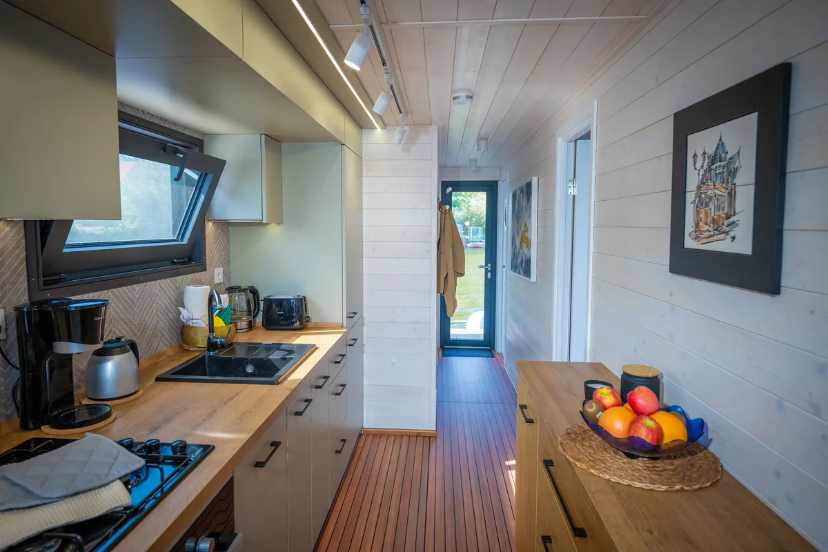 Galley of Aquila, a Woma D13 motorboat at Fürstenberg/Havel, Germany