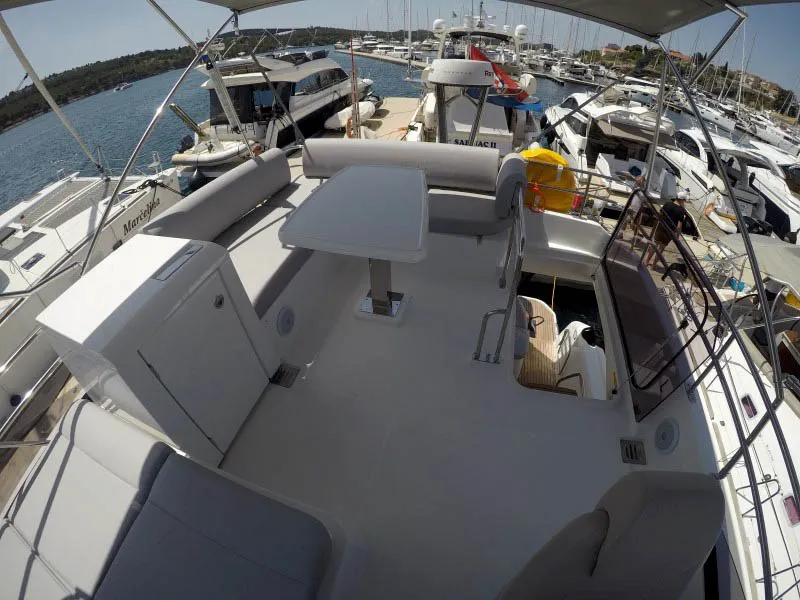 Deck of Brigadoon, a Jeanneau Prestige 420 Fly motor yacht at Grad Šibenik, Croatia