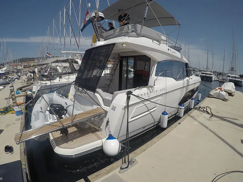 Exterior view of Brigadoon, a Jeanneau Prestige 420 Fly motor yacht at Grad Šibenik, Croatia