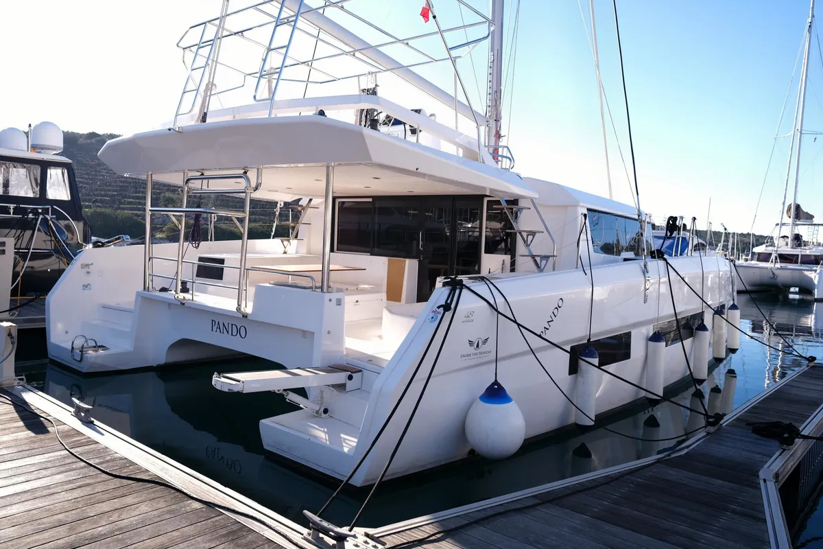 Exterior view of Pando, a Dufour 48 Catamaran catamaran at Primošten, Croatia