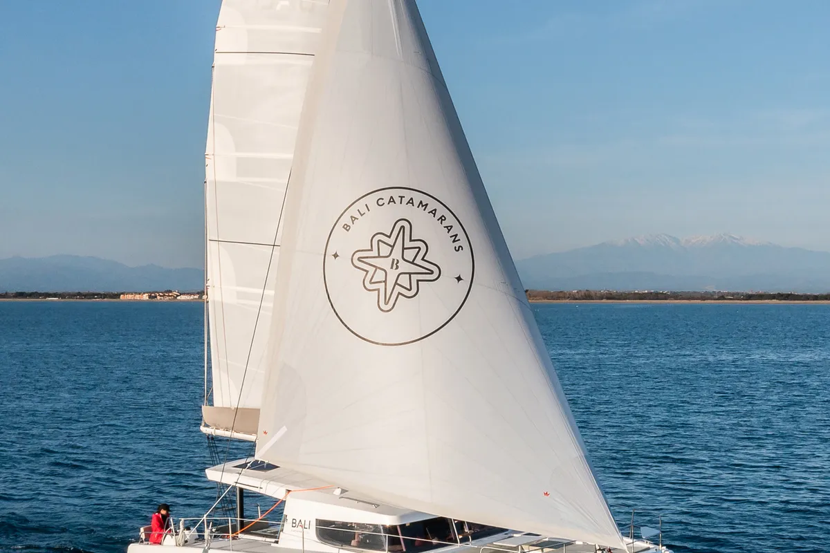 Exterior view of Comfort, a Bali 4.0 catamaran at Sant Antoni de Portmany, Spain