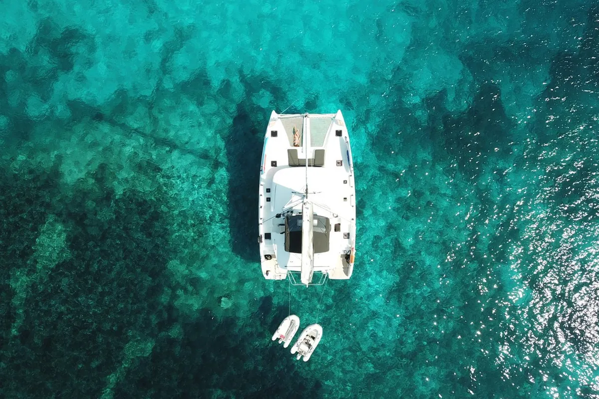 Exterior view of Sbronzo, a Lagoon 46 catamaran at Olbia, Italy
