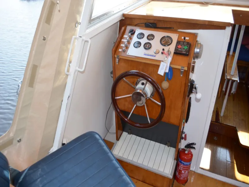 Cockpit of Woelwater, a De Drait Doerak 850 OK motorboat at Drachten, Netherlands