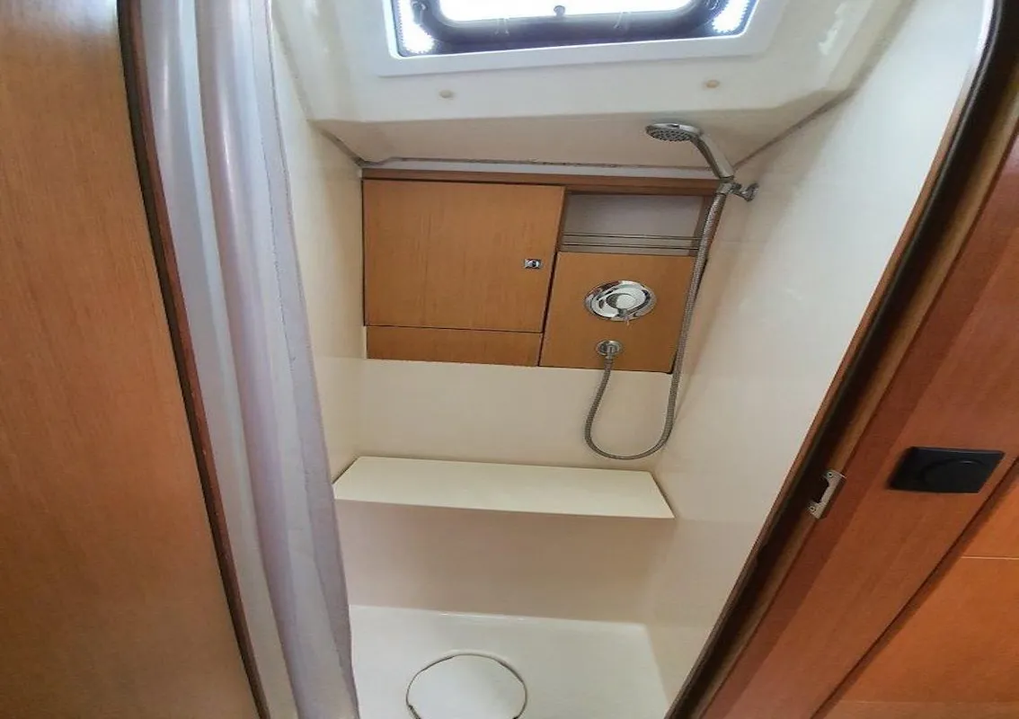 Head on Kingsman, a Bavaria Cruiser 46 sailboat at Mai Khao, Thailand
