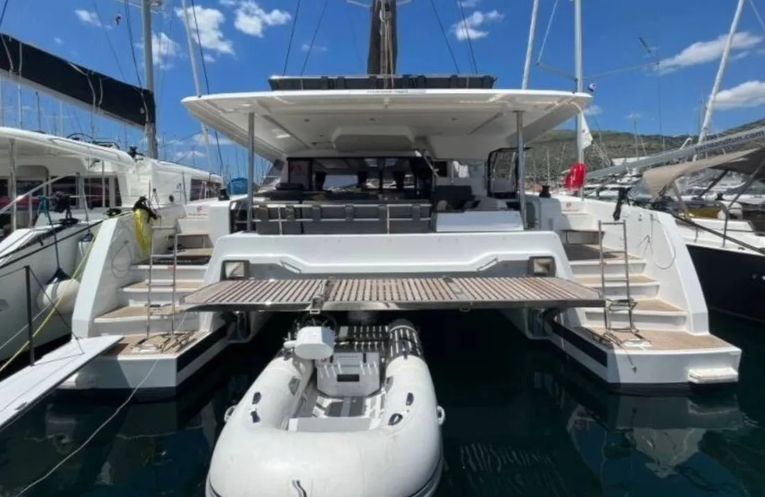 Exterior view of All Blue IV, a Fountaine Pajot Aura 51 catamaran at Athens, Greece