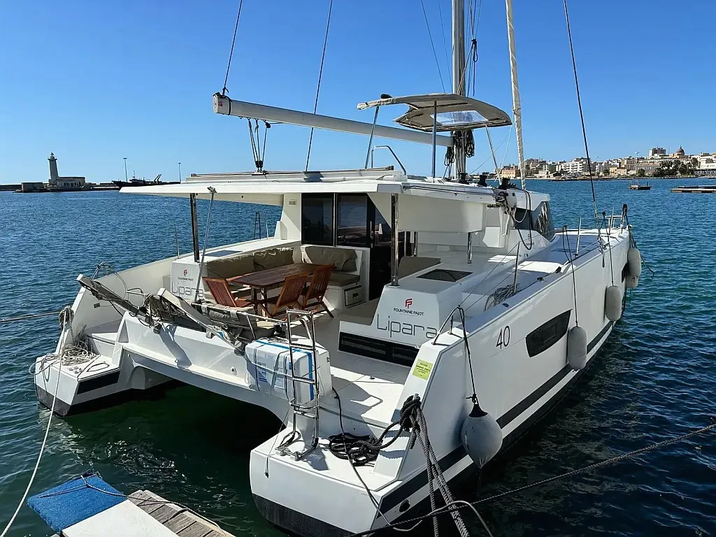 Exterior view of LIPARA, a Fountaine Pajot Lucia 40 catamaran at U Pàize, Italy