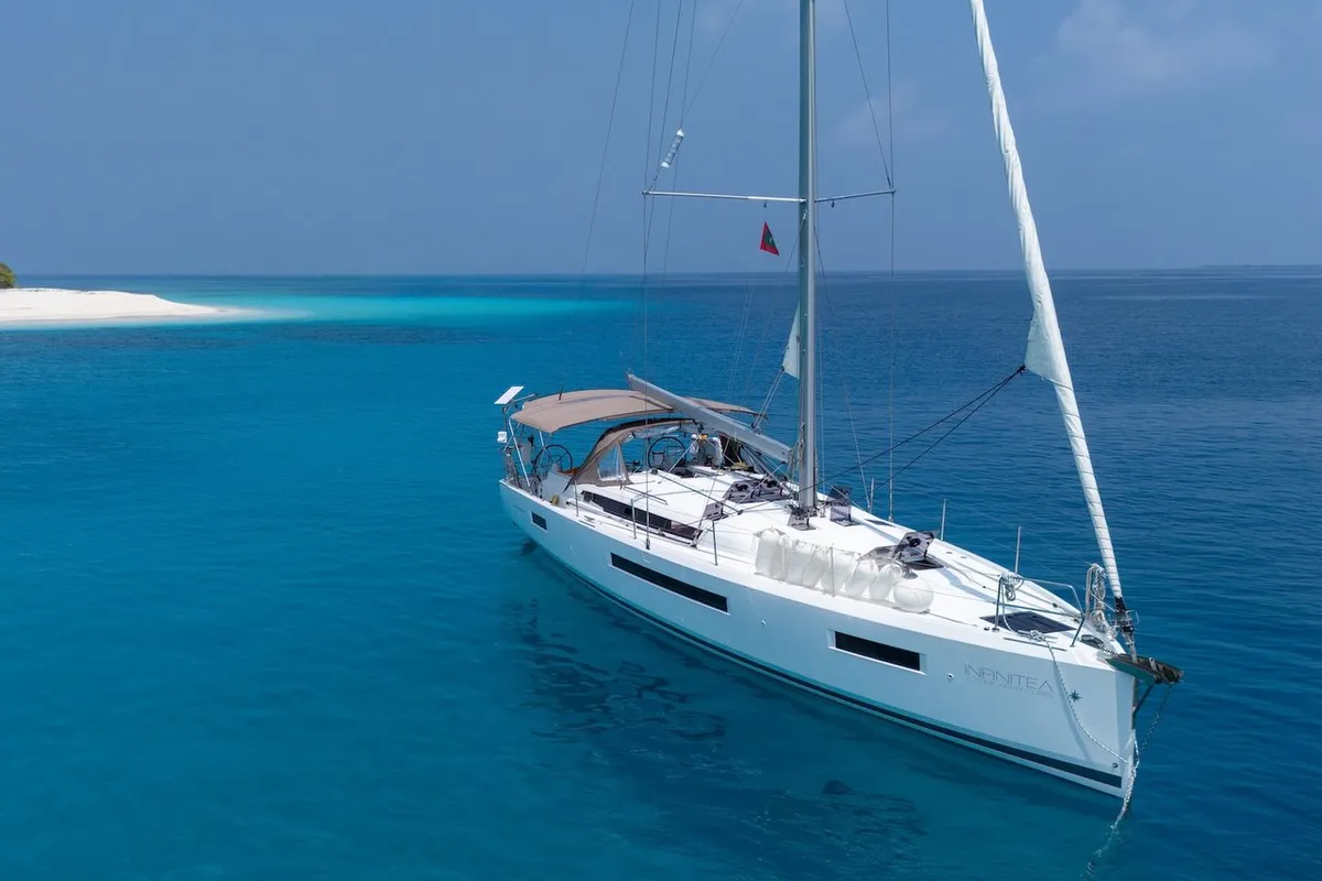 Infinitea, a Jeanneau Sun Odyssey 490 sailboat at Malé, Maldives