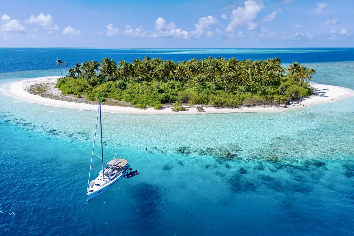 Infinitea, a Jeanneau Sun Odyssey 490 sailboat at Malé, Maldives