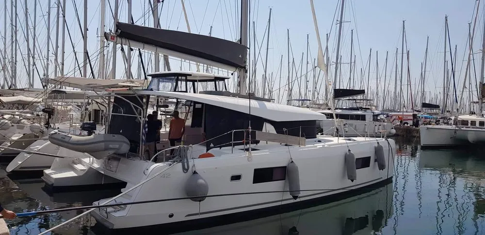 Exterior view of Miss Nastazia, a Lagoon 42 catamaran at Salamina, Greece