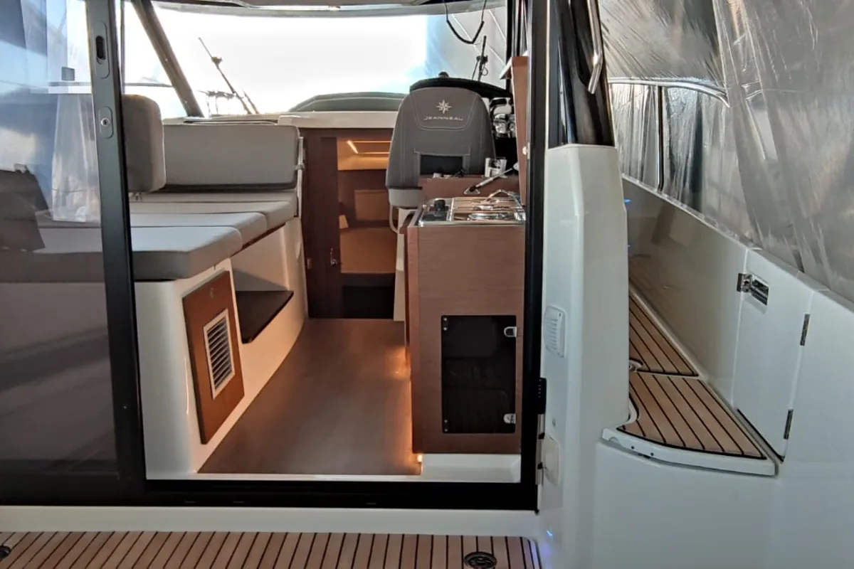 Salon of Gloria, a Jeanneau Merry Fisher 895 motorboat at Bacoli, Italy