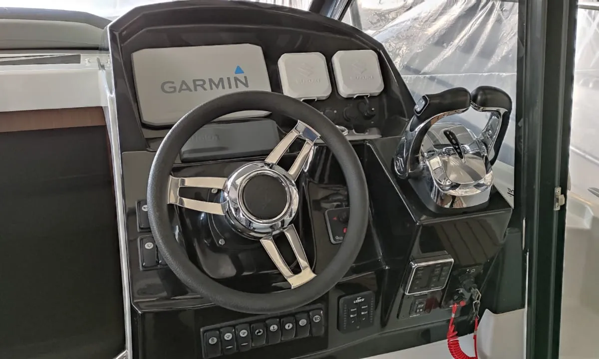 Cockpit of Gloria, a Jeanneau Merry Fisher 895 motorboat at Bacoli, Italy