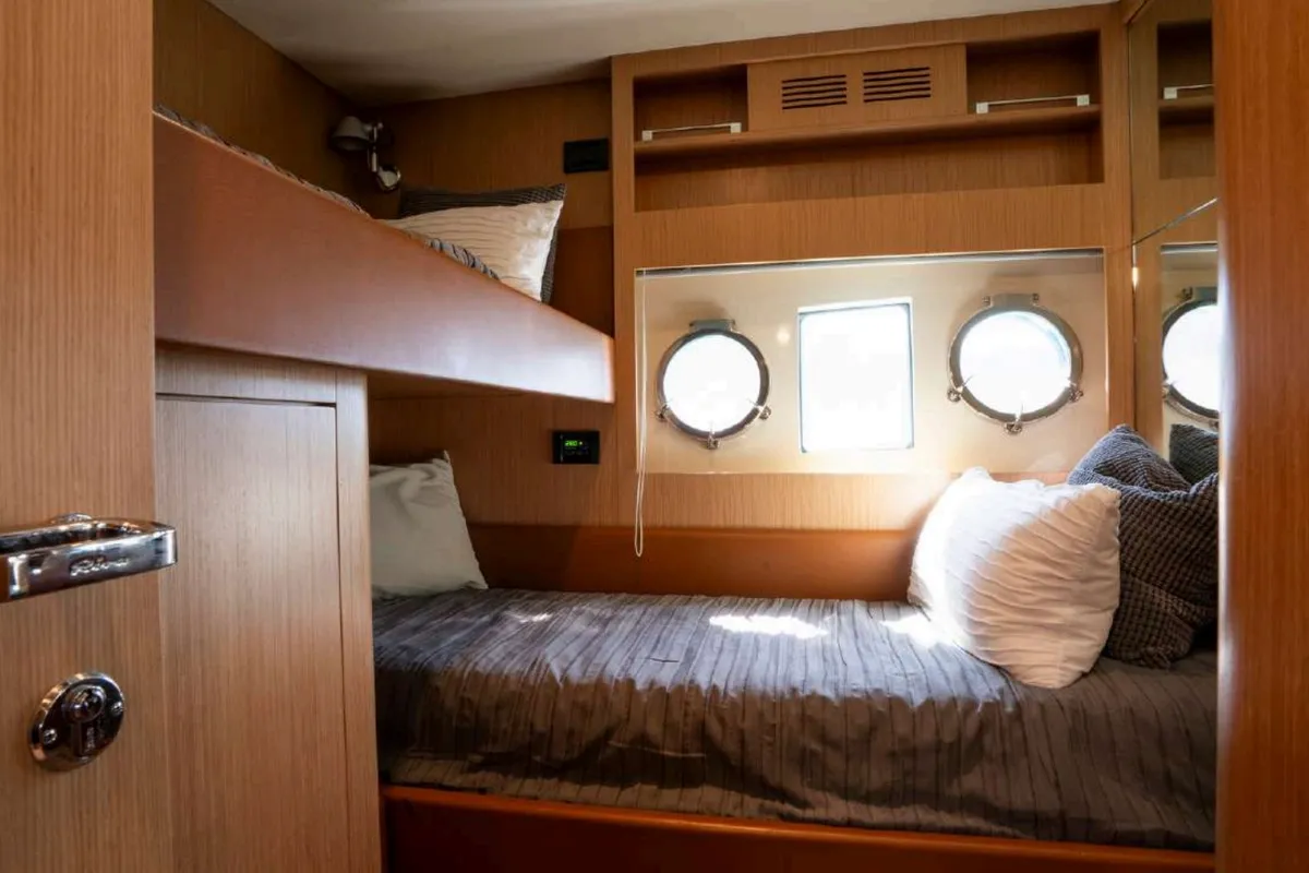 Cabin on Headquarters, a Riva 63 Virtus motor yacht at Palma de Mallorca, Spain