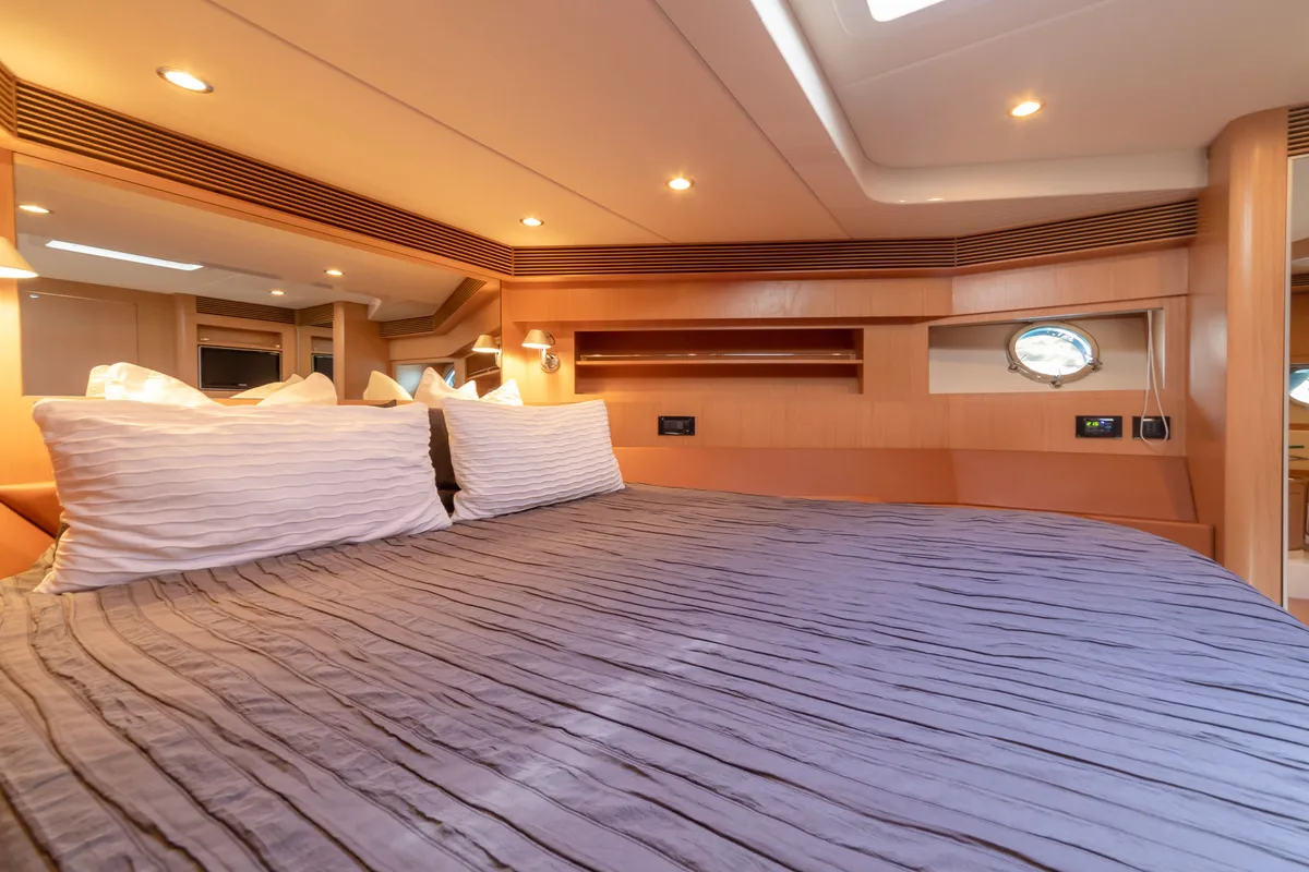 Cabin on Headquarters, a Riva 63 Virtus motor yacht at Palma de Mallorca, Spain