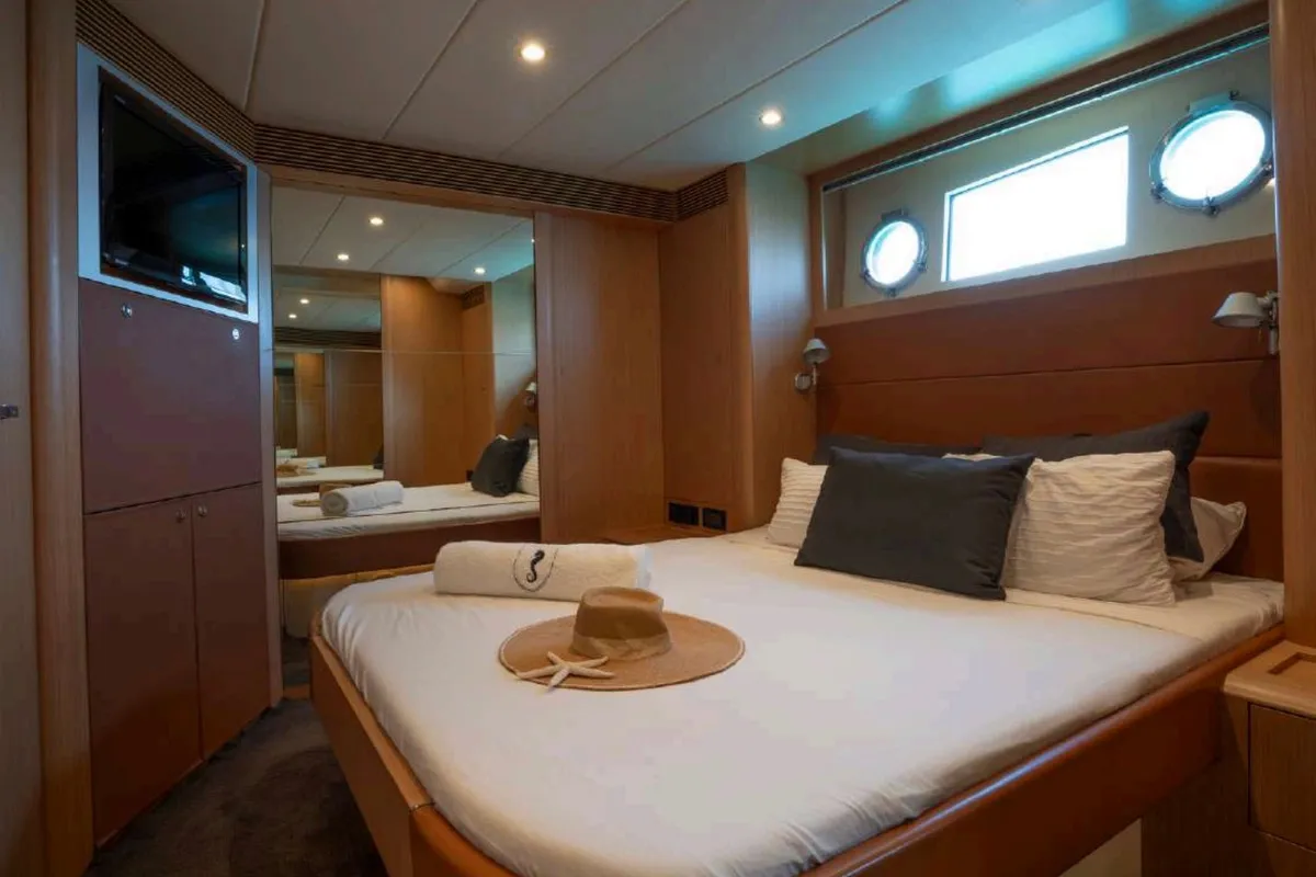 Cabin on Headquarters, a Riva 63 Virtus motor yacht at Palma de Mallorca, Spain