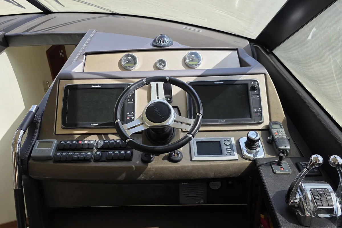 Cockpit of Very Bery, a Prestige 550 Fly motorboat at Primošten, Croatia
