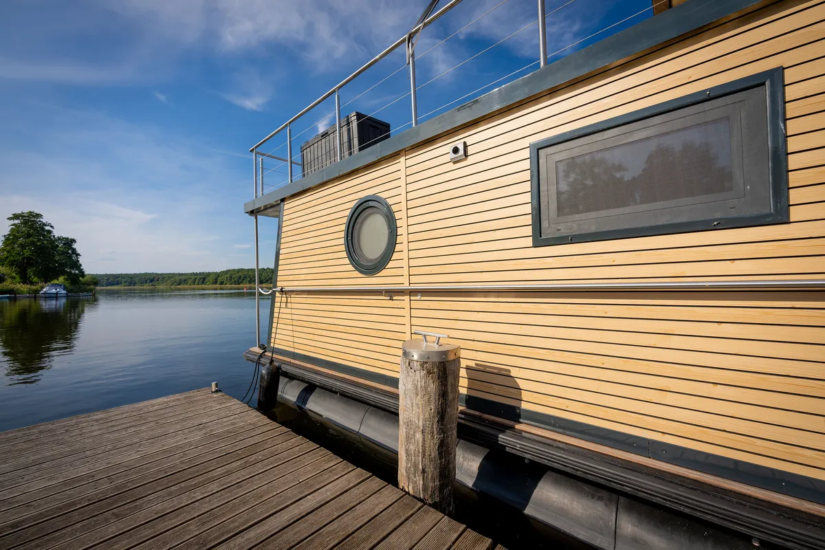 Exterior view of Frigga, a Woma D13 motorboat at Fürstenberg/Havel, Germany
