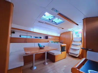 Salon of MIENTRAS TANTO, a Jeanneau Sun Odyssey 449 sailboat at Sant Antoni de Portmany, Spain