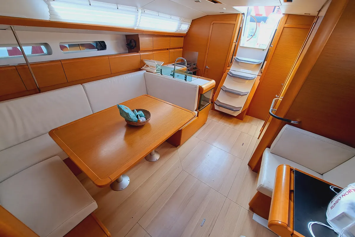 Salon of MIENTRAS TANTO, a Jeanneau Sun Odyssey 449 sailboat at Sant Antoni de Portmany, Spain