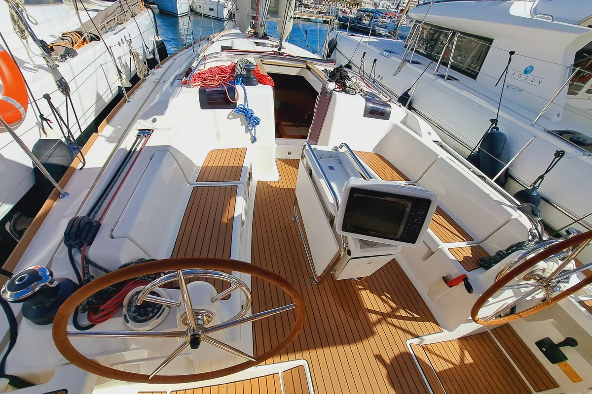 Cockpit of MIENTRAS TANTO, a Jeanneau Sun Odyssey 449 sailboat at Sant Antoni de Portmany, Spain