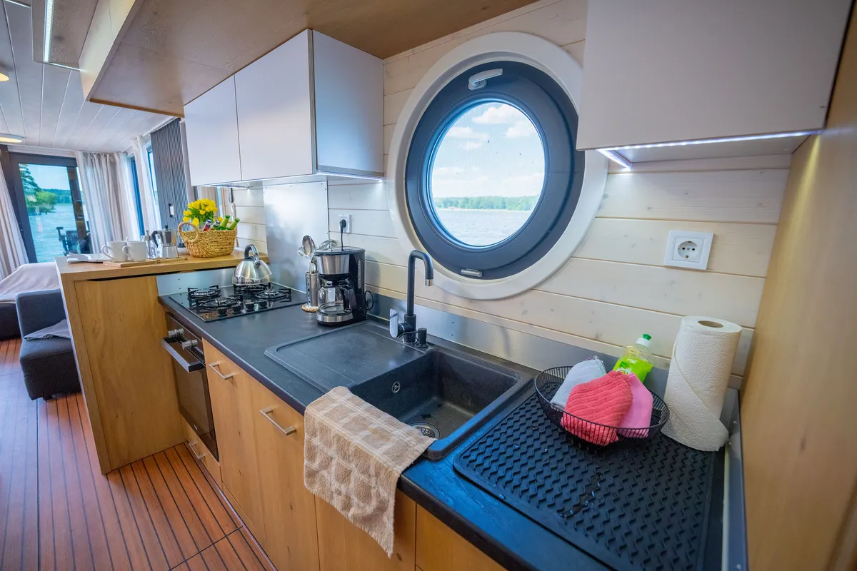Galley of RedWine, a Woma D13 motorboat at Fürstenberg/Havel, Germany