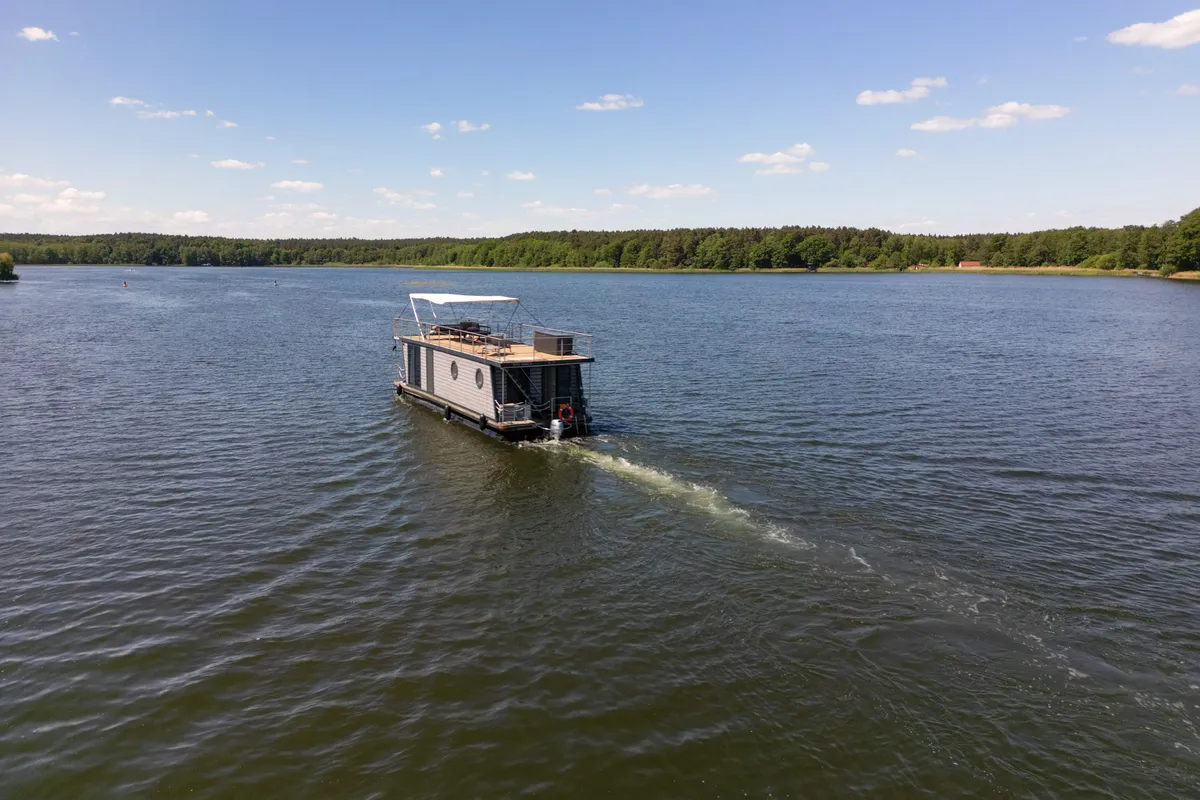 Exterior view of RedWine, a Woma D13 motorboat at Fürstenberg/Havel, Germany