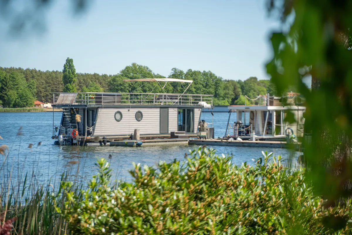 Exterior view of RedWine, a Woma D13 motorboat at Fürstenberg/Havel, Germany