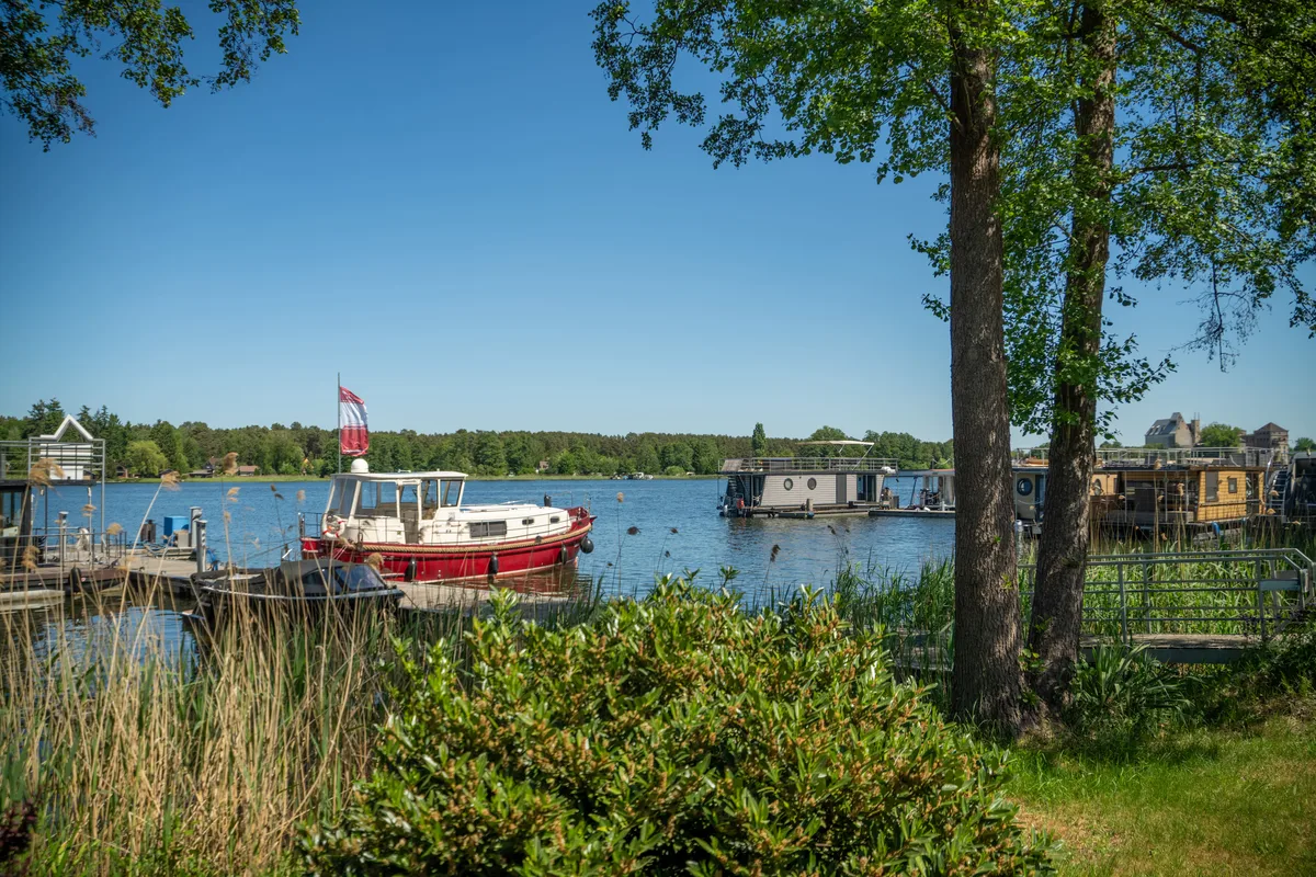 Exterior view of RedWine, a Woma D13 motorboat at Fürstenberg/Havel, Germany