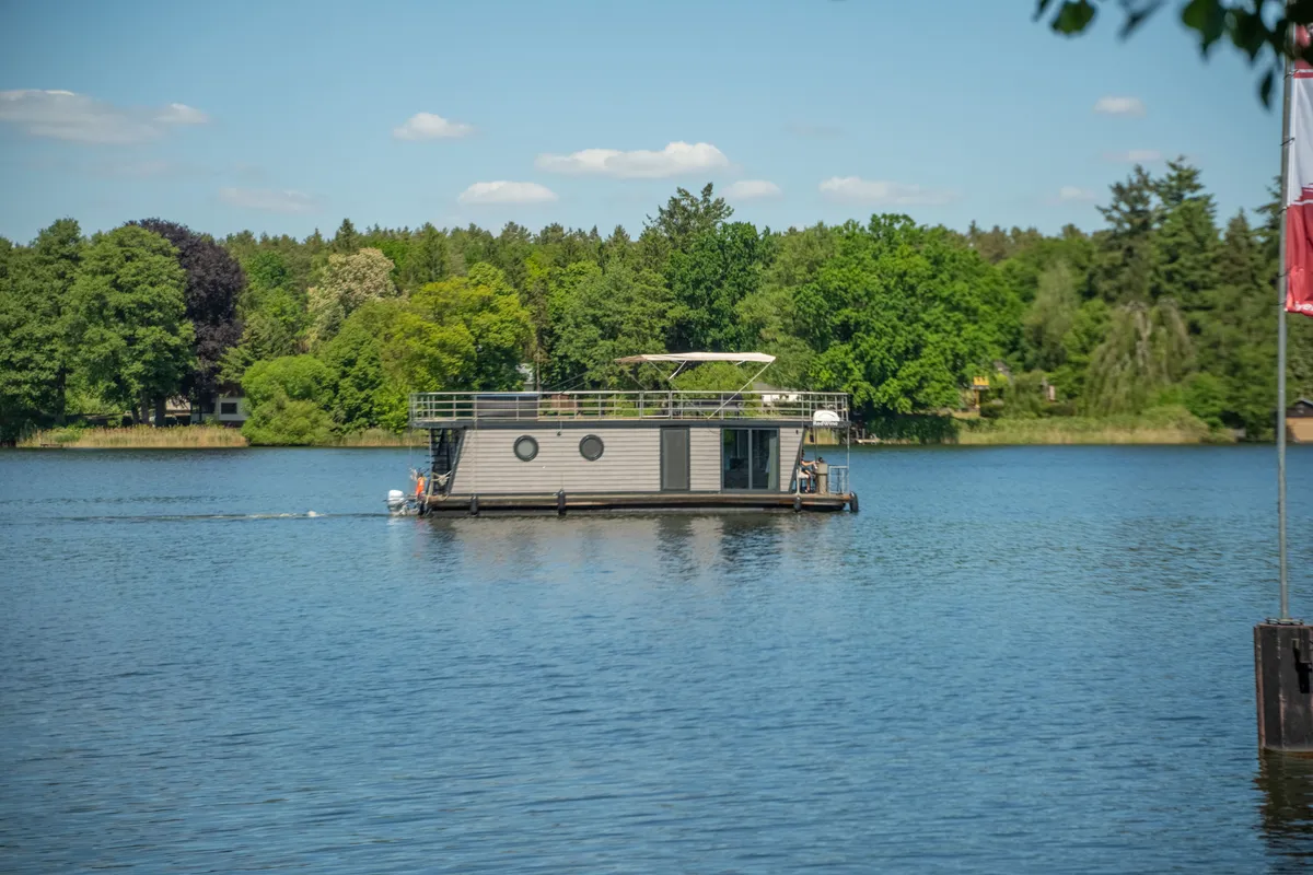 Exterior view of RedWine, a Woma D13 motorboat at Fürstenberg/Havel, Germany